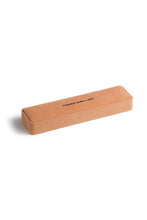 Orange jewelry box with 'PORTER JEWELLERY' branding on a white background